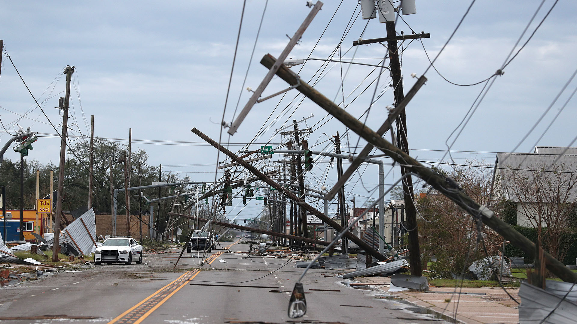 LAKE CHARLES, LOUISIANA - AUGUST 27: A street is seen strewn with debris and downed power lines after Hurricane Laura passed through the area on August 27, 2020 in Lake Charles, Louisiana . The hurricane hit with powerful winds causing extensive damage to the city.   Joe Raedle/Getty Images/AFP