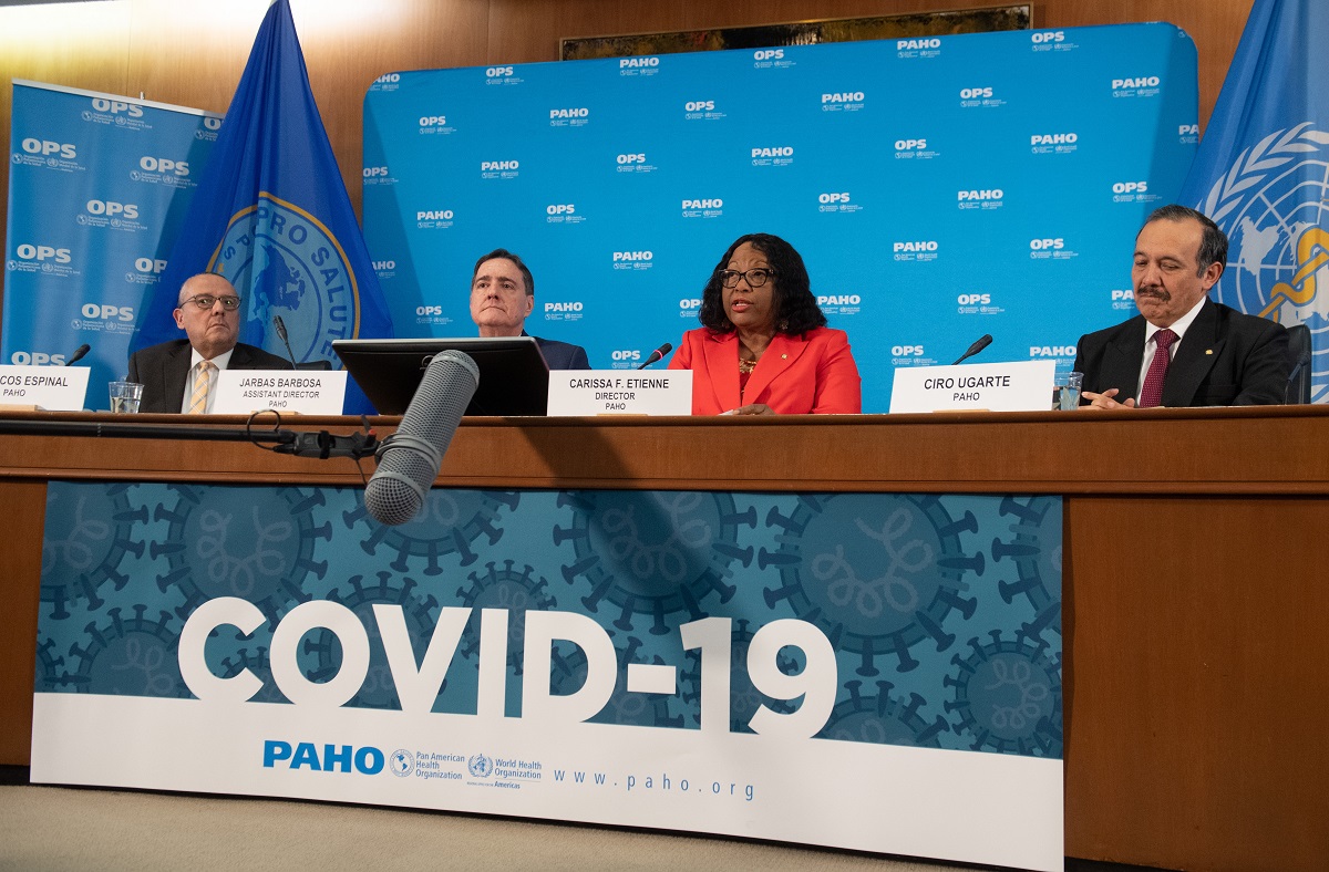 Marcos Espinal (L), Director of the Department of Communicable Diseases and Health Analysis at the Pan American Health Organization (PAHO),  Jarbas Barbosa da Silva Jr. (2L), assistant director of PAHO,  Carissa Etienne (2R), Director of the PAHO and World Health Organization (WHO) Regional Director for the Americas, and Ciro Ugarte (R), Director of the PAHO Health Emergencies Department, hold a press briefing about the Coronavirus at PAHO Headquarters in Washington, DC, March 6, 2020. (Photo by SAUL LOEB / AFP)